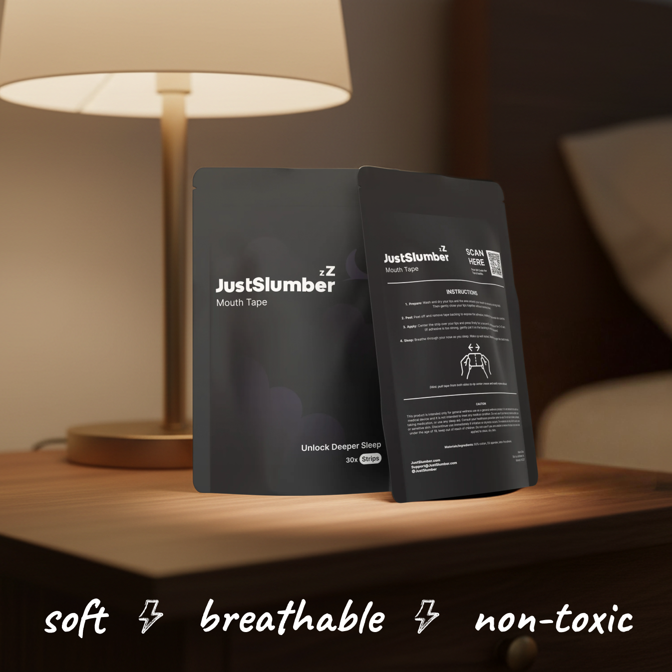 Two packages of JustSlumber mouth tape on a wooden surface with a lamp in the background.
